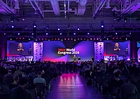 Main stage at WeAreDeveloper World Congress Berlin 2025, where a speaker is talking to a large audience