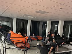 Community members relaxing at the sprint lounge at the TYPO3 GmbH office.