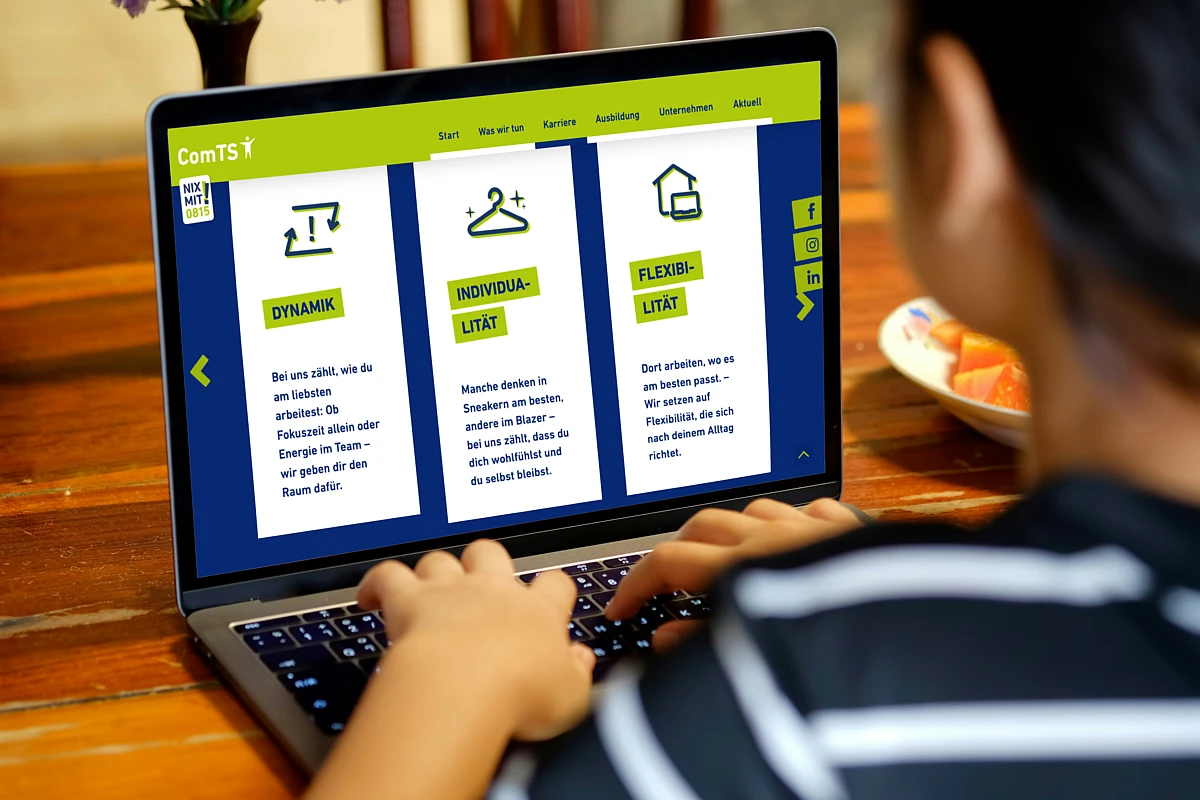 A person browsing the ComTS careers website on a laptop, showing company values such as flexibility, individuality, and dynamic teamwork.